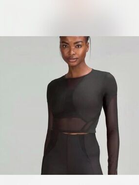 Barely worn Lululemon Black Sheer Long-Sleeve Crop Top. Size M